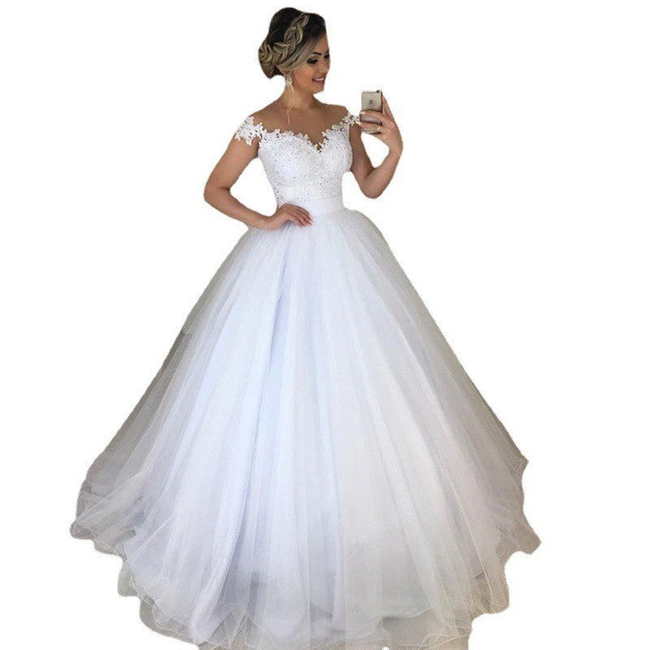 Levoire | Glamourösi dentelle bordure pufftrail robe de mariée