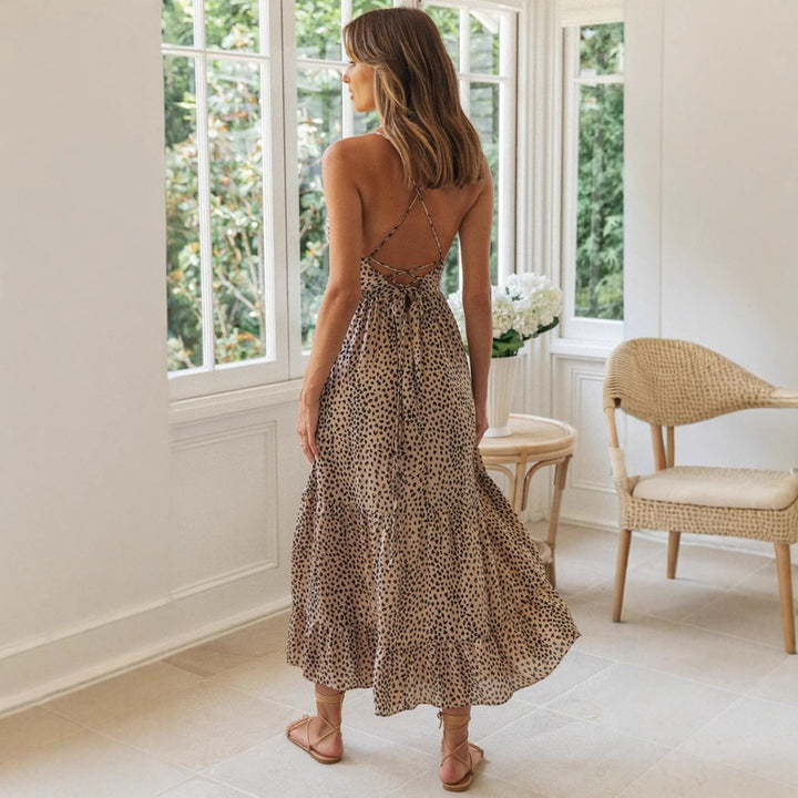 Robe longue pour femme en imprimé léopard de style boho avec des bretelles spaghetti et une jupe fluide Levoire