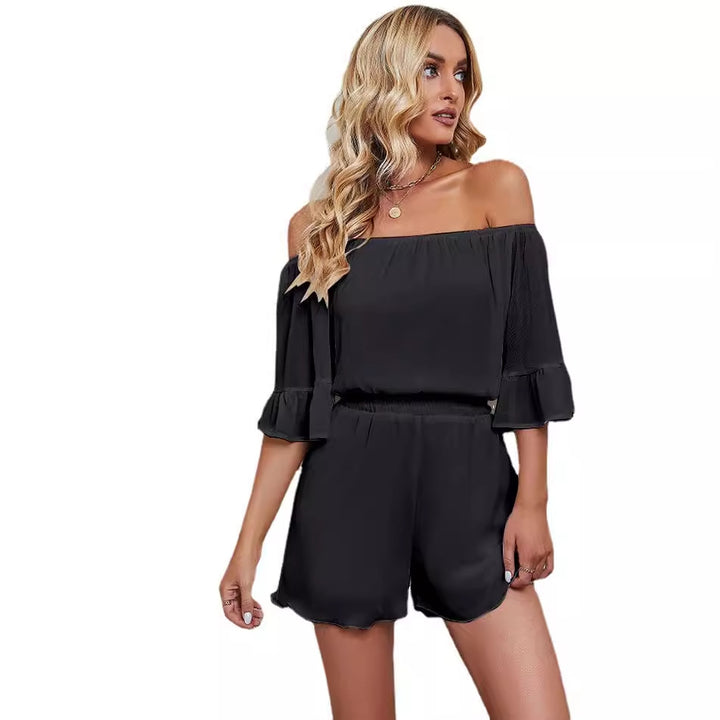 Combinaison femme à épaules nues avec manches volumineuses et taille élastique Levoire