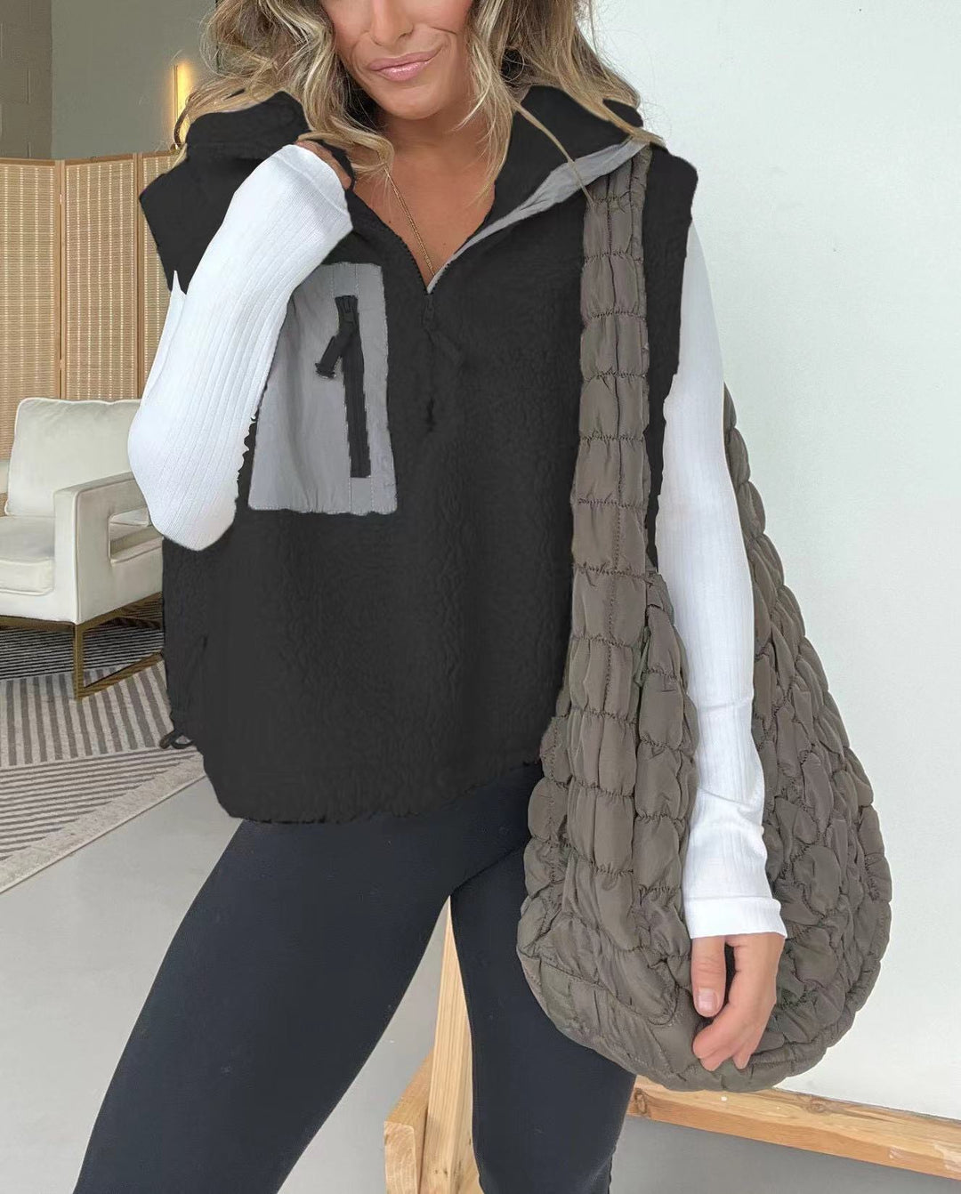 Gilet en polaire matelassé pour femmes avec fermeture éclair pratique et poches en fausse fourrure Levoire