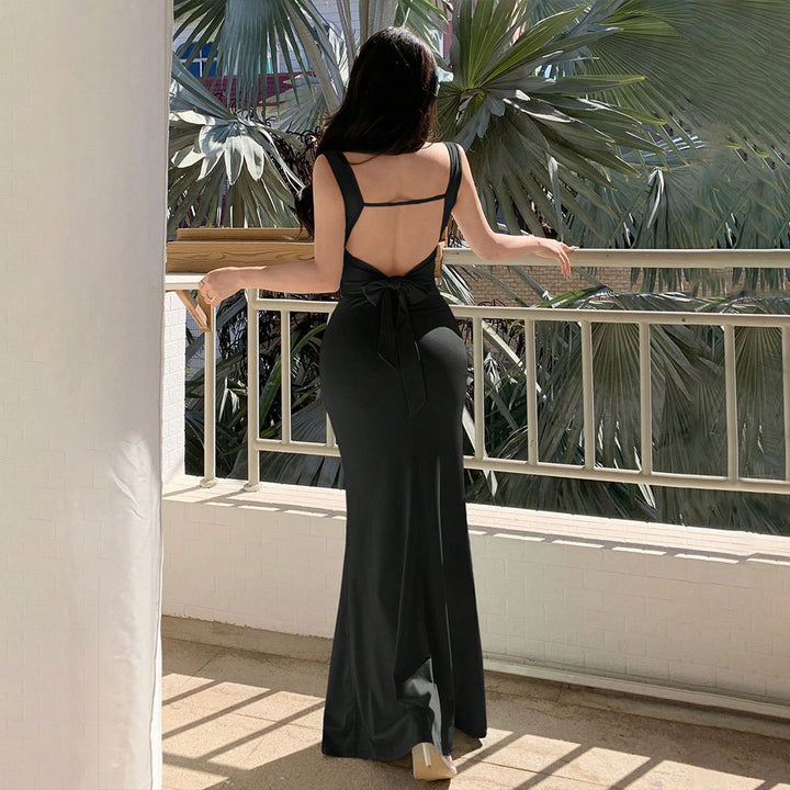 Robe de soirée élégante pour femmes avec découpes arrière raffinées et ceinture décorative à nouer Levoire