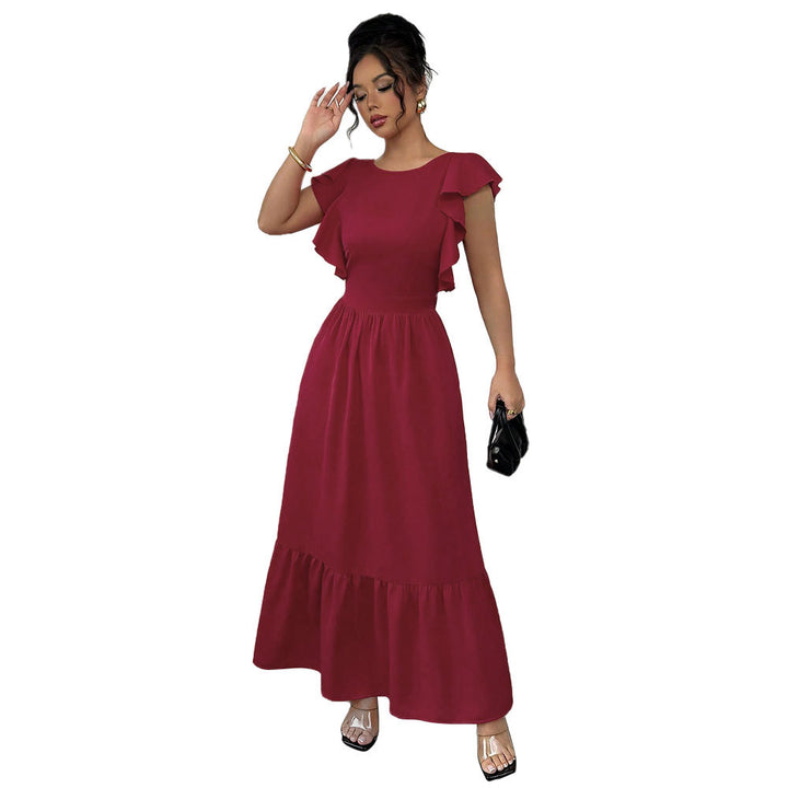 Robe maxi femme avec des détails de volants volumineux et une découpe sophistiquée dans le dos Levoire