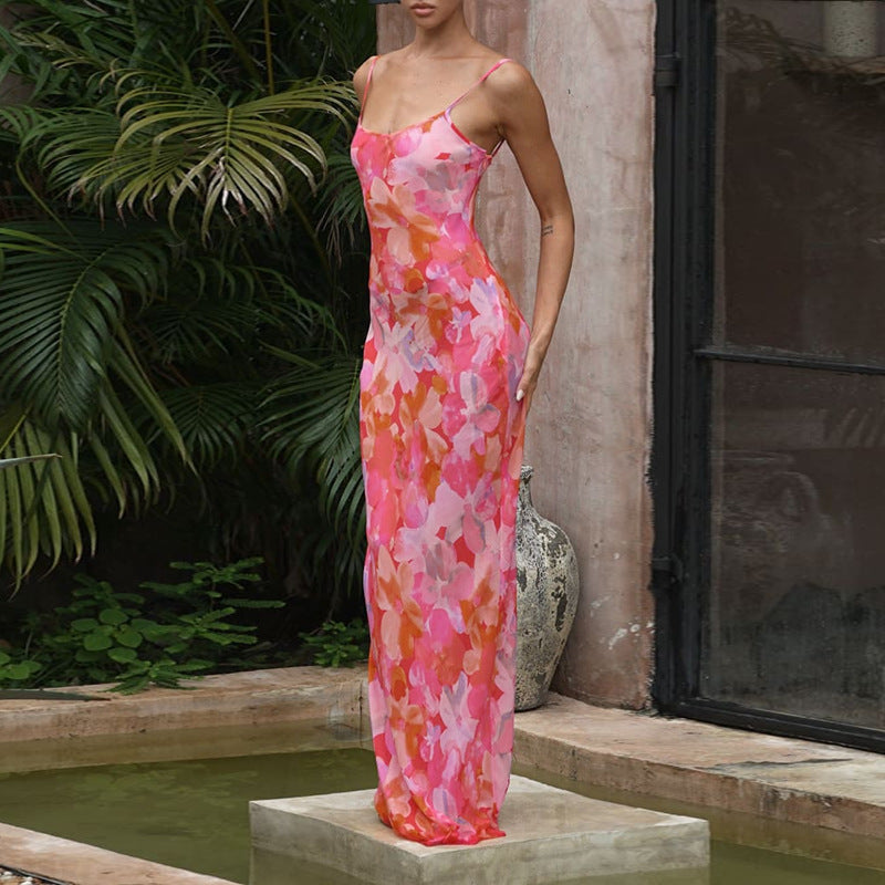 Robe maxi florale élégante pour femme avec des bretelles spaghetti délicates et une coupe fluide Levoire