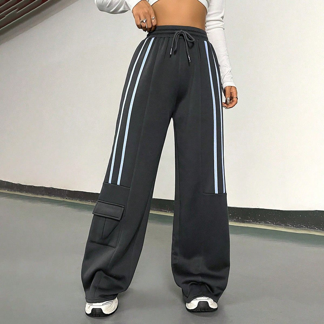 Pantalons de sport amples pour femmes au style streetwear urbain avec taille élastique et poches pratiques Levoire