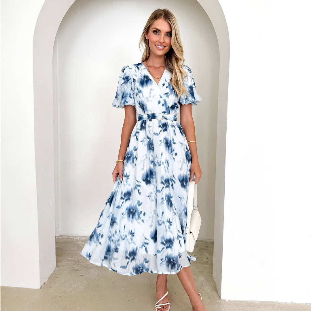 Robe midi pour femmes avec un design enveloppant ludique et des accents floraux Levoire
