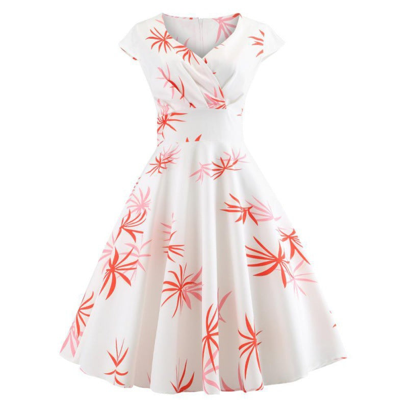 Robe à swing pour femmes avec un design enveloppant élégant et des accents floraux Levoire