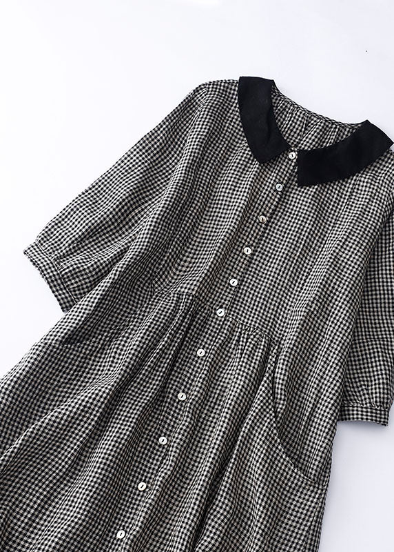 Levoire | Robe noire à carreaux avec col Peter Pan