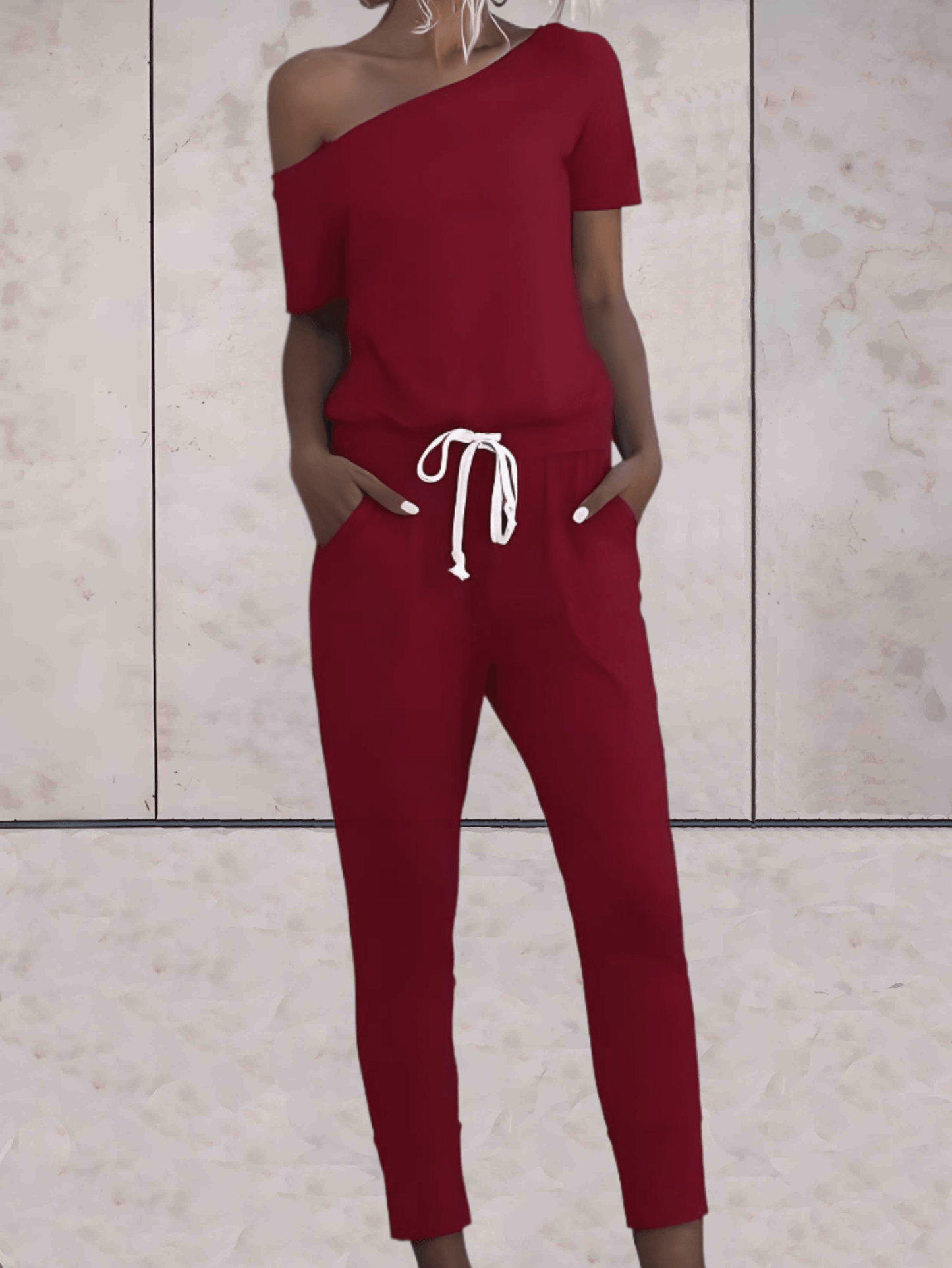 Levoire | Combinaison Confortable À Une Épaule Avec Des Manches Dénudées Et Un Bouton Réglable Aux Hanches