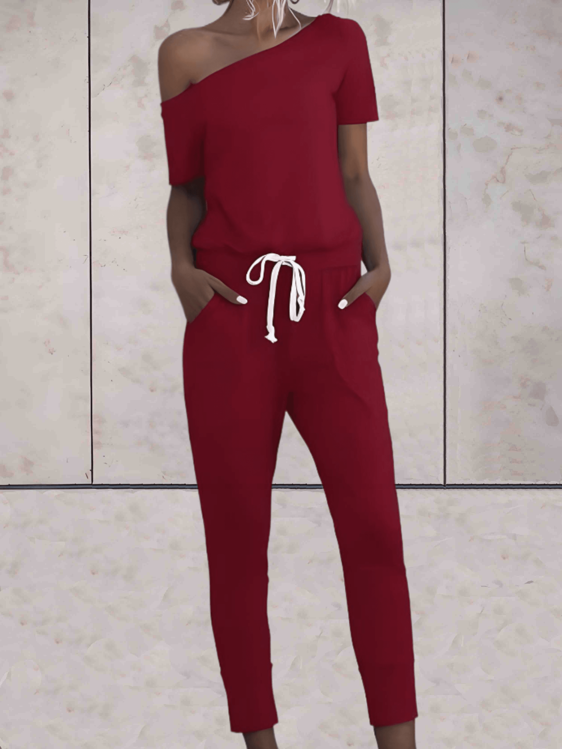 Levoire | Combinaison Confortable À Une Épaule Avec Des Manches Dénudées Et Un Bouton Réglable Aux Hanches