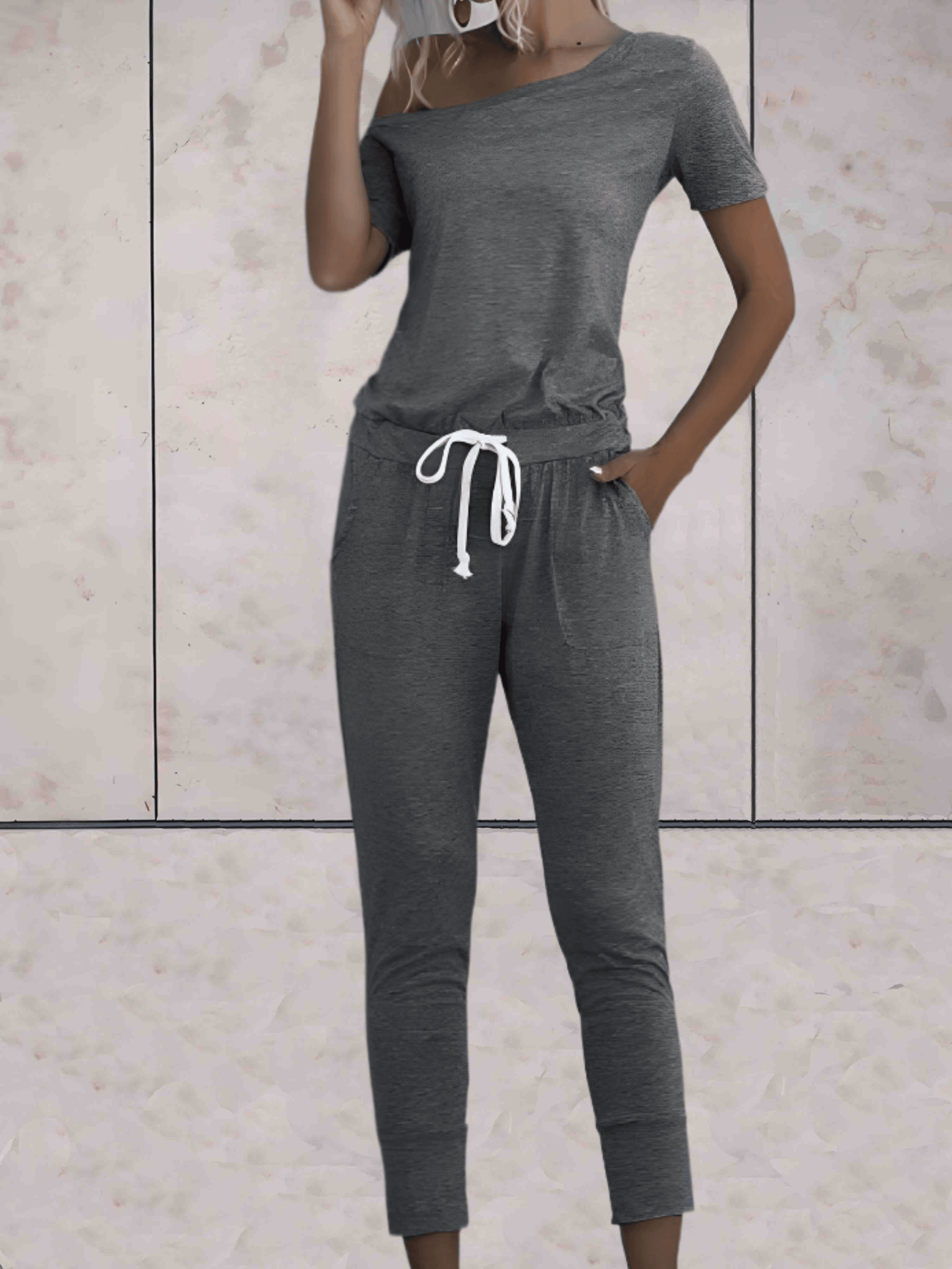 Levoire | Combinaison Confortable À Une Épaule Avec Des Manches Dénudées Et Un Bouton Réglable Aux Hanches