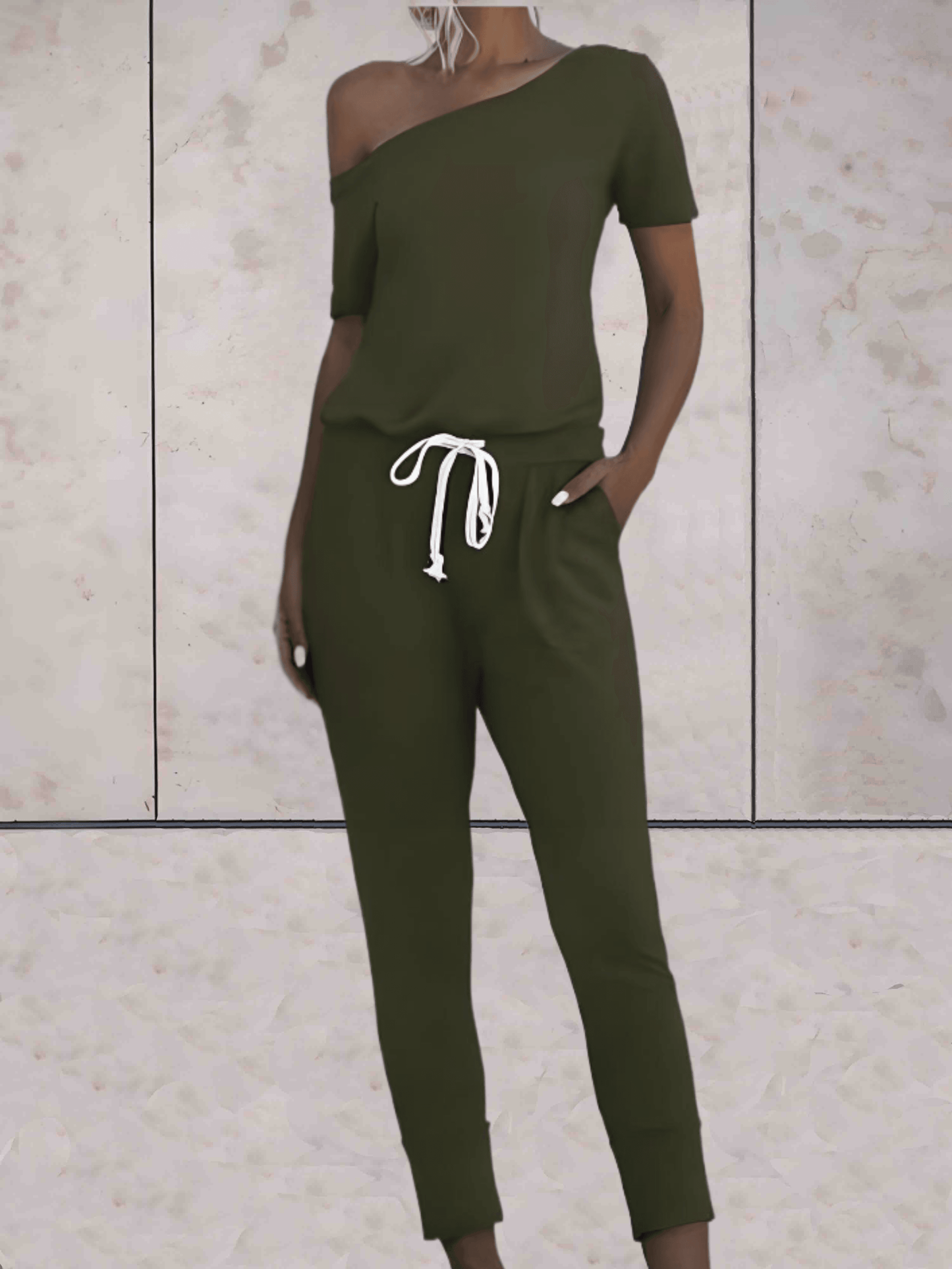 Levoire | Combinaison Confortable À Une Épaule Avec Des Manches Dénudées Et Un Bouton Réglable Aux Hanches