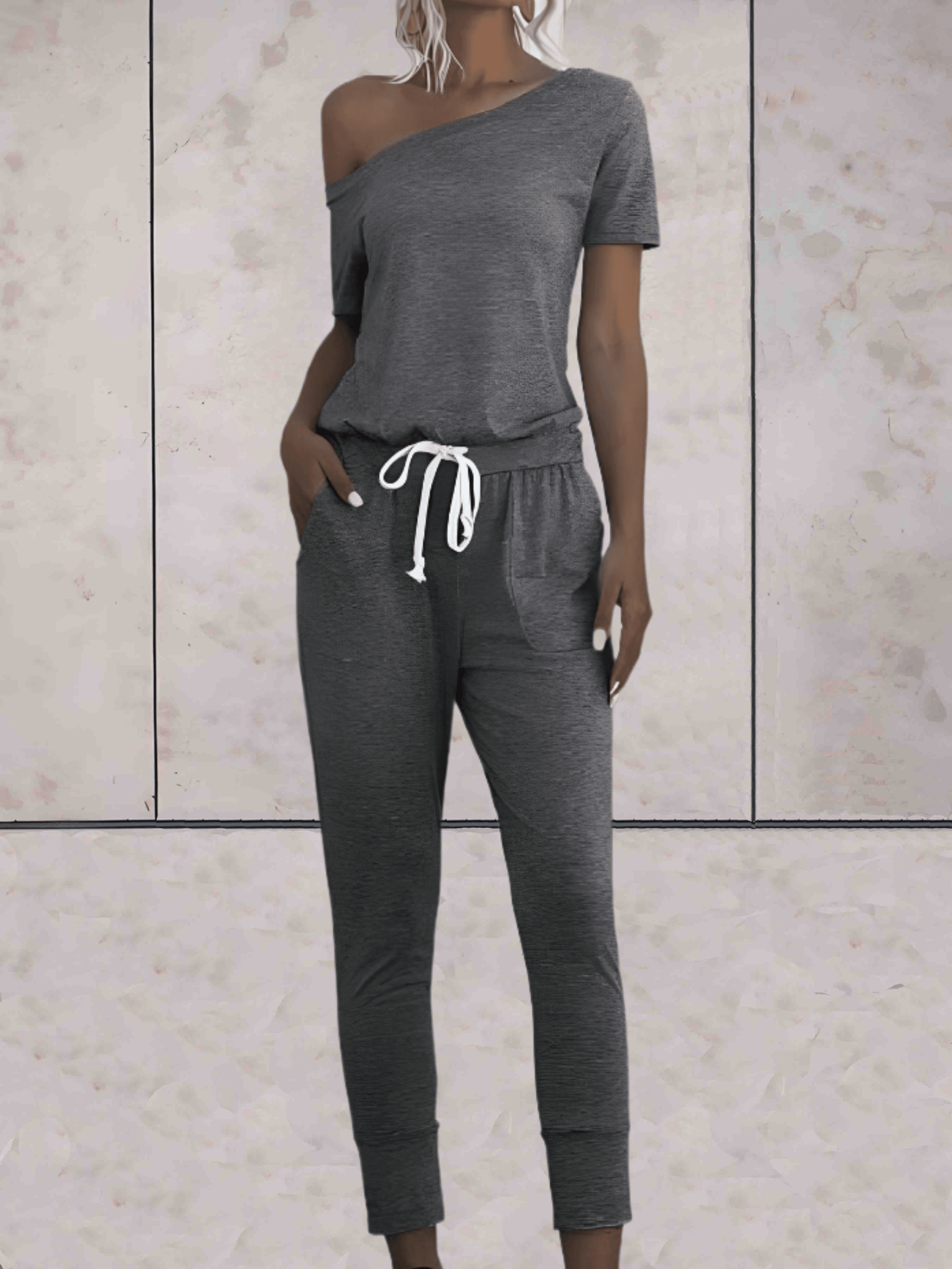 Levoire | Combinaison Confortable À Une Épaule Avec Des Manches Dénudées Et Un Bouton Réglable Aux Hanches Gris