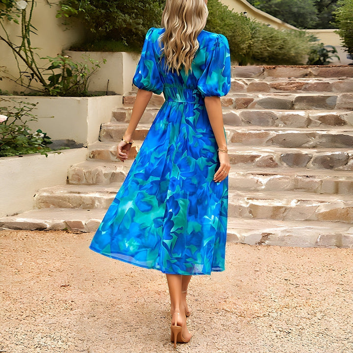 Levoire | Robe midi avec décolleté en V à la mode
