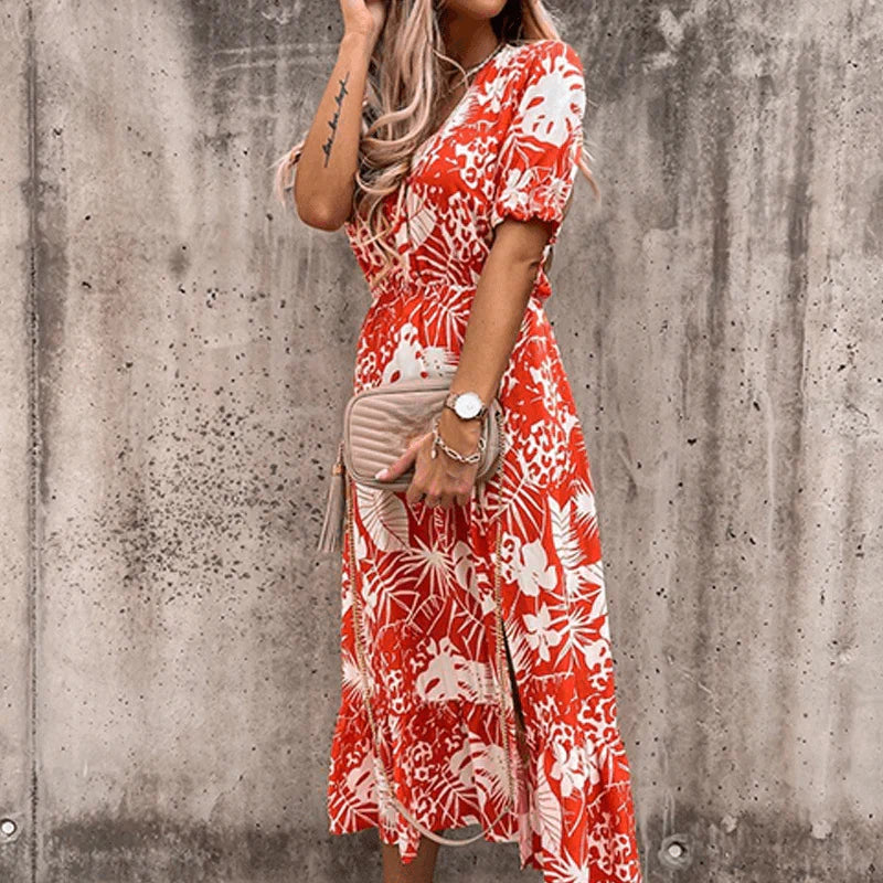 Levoire | Élégante Robe Portefeuille Avec Motif Floral Orange