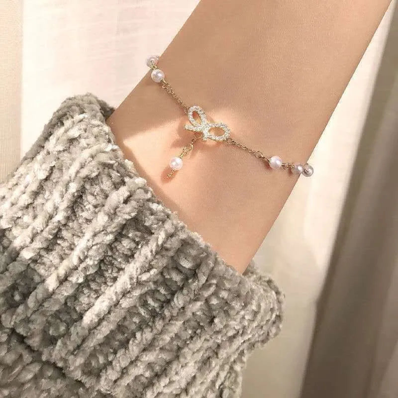 Levoire | Bracelet Élégant En Perles Avec Nœud En Cristal