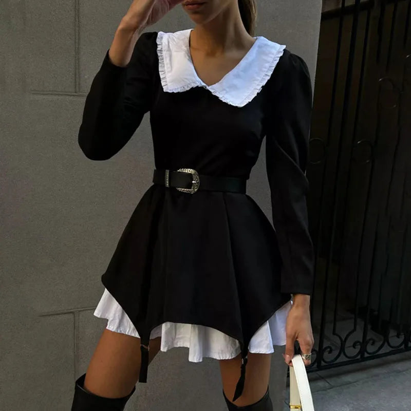 Levoire | Robe Élégante Avec Des Blocs De Couleur Et Des Volants Ludiques Noir