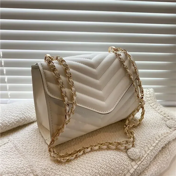 Levoire | Sac À Bandoulière Moderne Avec Détails En Chaîne