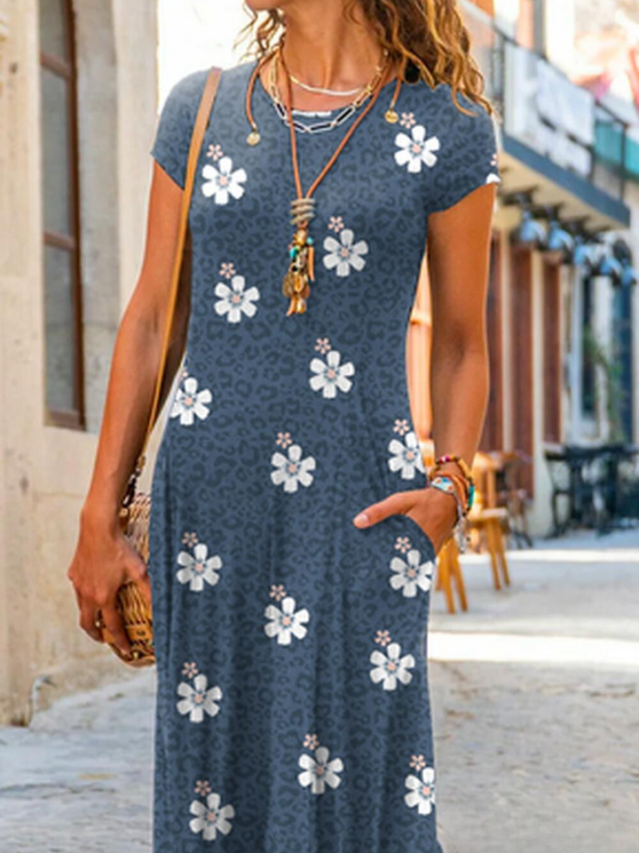 Levoire | Robe florale décontractée à manches courtes avec col rond et raccords surdimensionnés