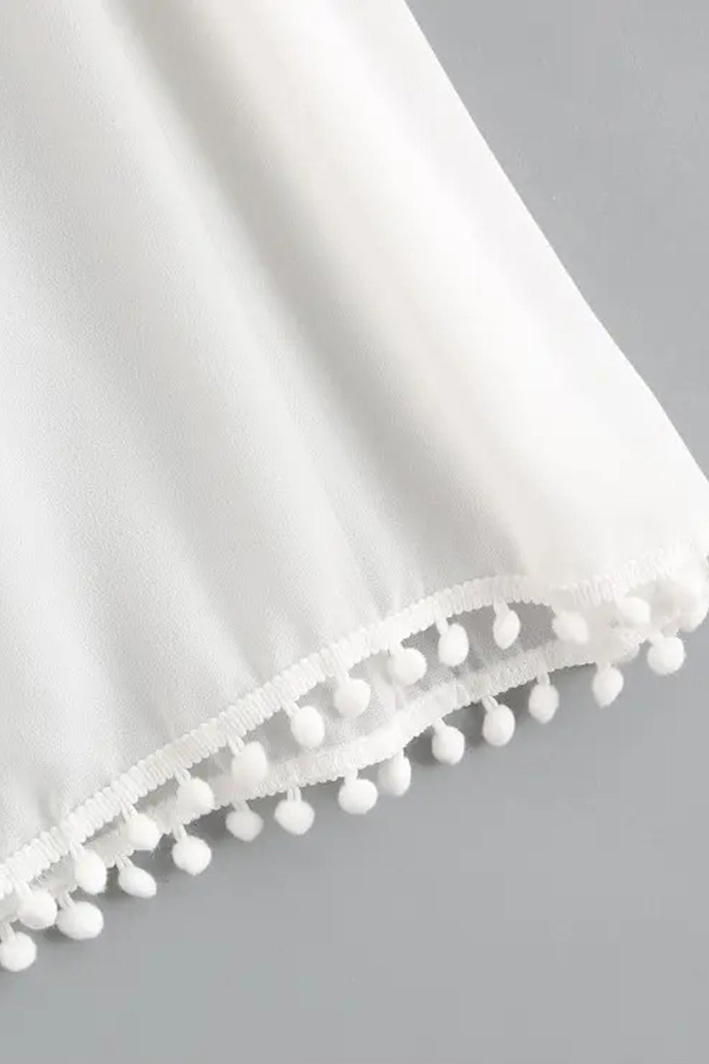 Levoire | Robe de plage en chiffon à pompons