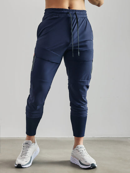 Levoire | Pantalon d'entraînement avec Résistance à l'Eau et Design Urbain pour Tous les Sports