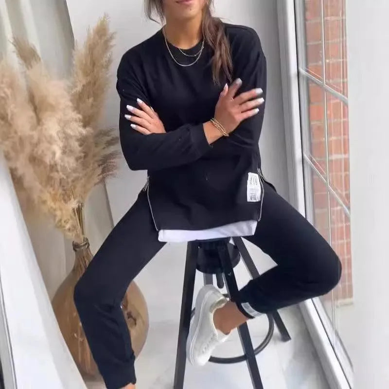 Levoire | Ensemble décontracté parfait en deux parties, avec un sweat à col ras du cou et un pantalon slim-fit Noir