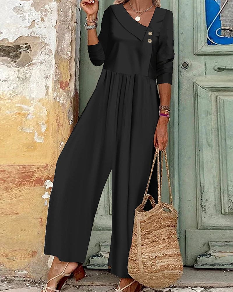 Levoire | Une Salopette Unie Avec Un Col Asymétrique Noir