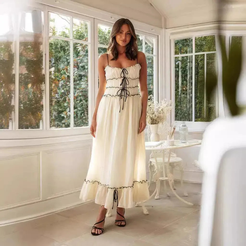 Levoire | Robe longue avec des bretelles estivales et motif à pois avec un ruban Blanc