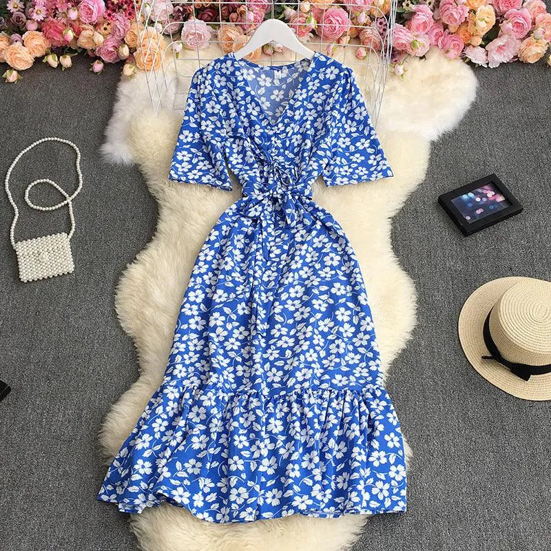 Levoire | Robe à fleurs à encolure en V avec manches bouffantes Bleu Une taille