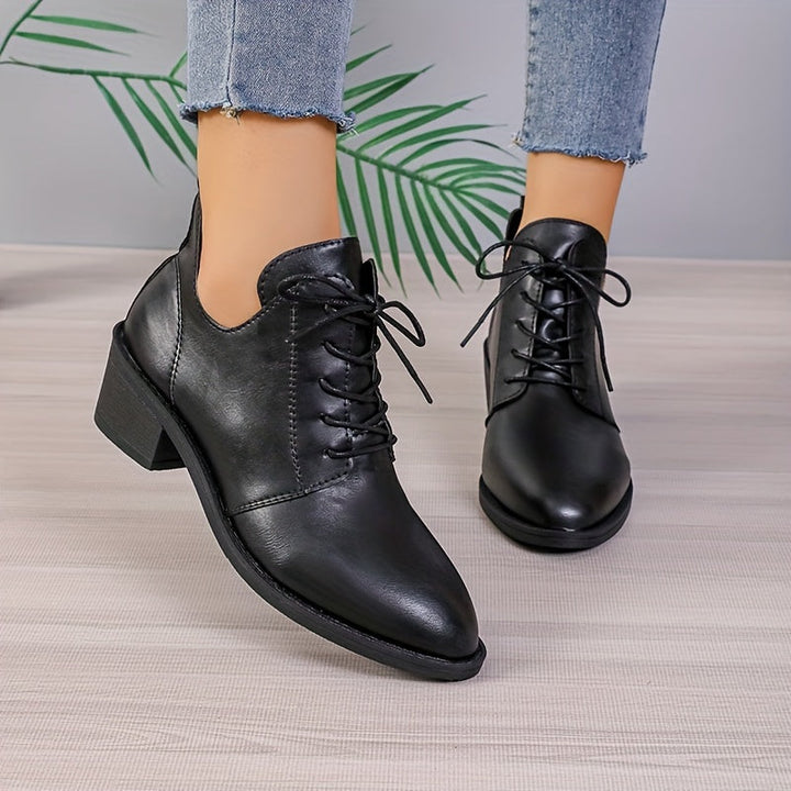 Levoire | Bottes Unies Élégantes Avec Lacets Et Talons