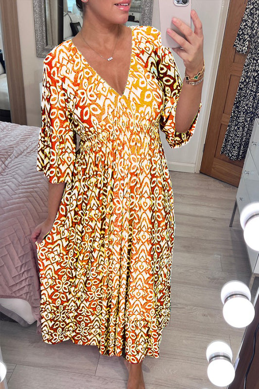 Levoire | Robe bohème avec décolleté en V Jaune