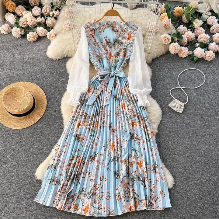 Levoire | Robe avec imprimé ethnique pour femmes, dotée d'un motif floral à nouer Robe fleurie bleue Taille libre