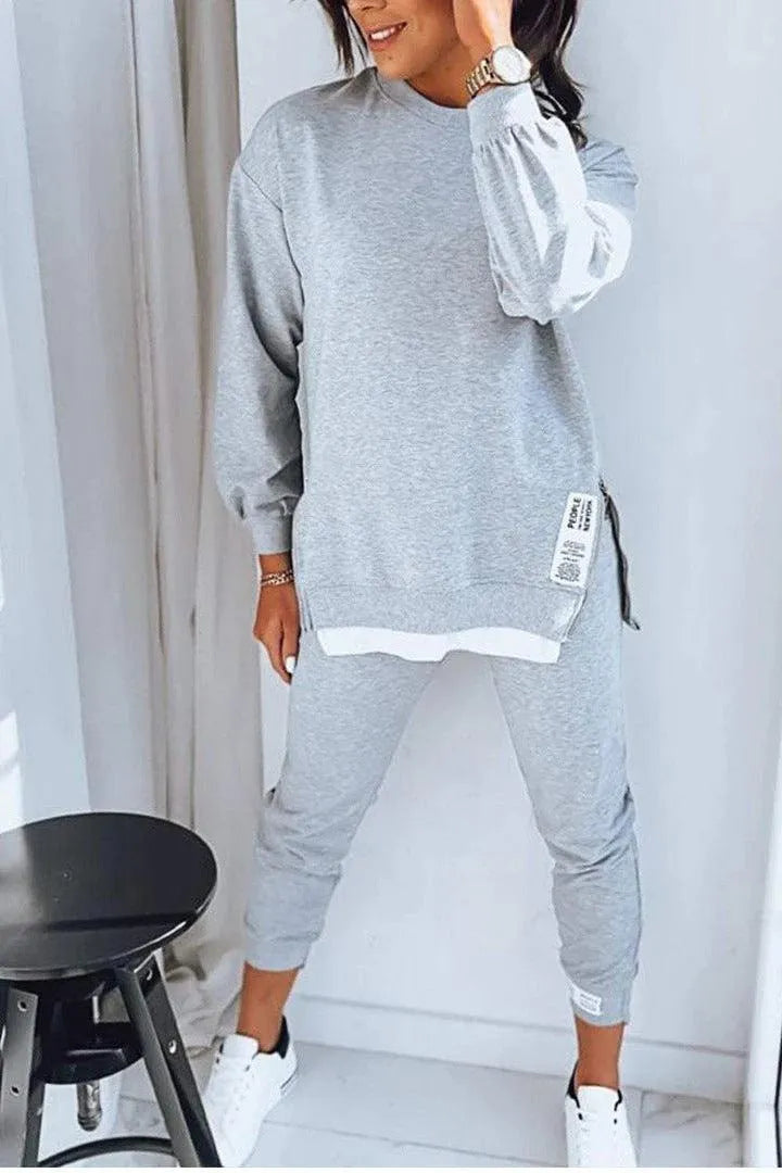 Levoire | Ensemble décontracté parfait en deux parties, avec un sweat à col ras du cou et un pantalon slim-fit Gris