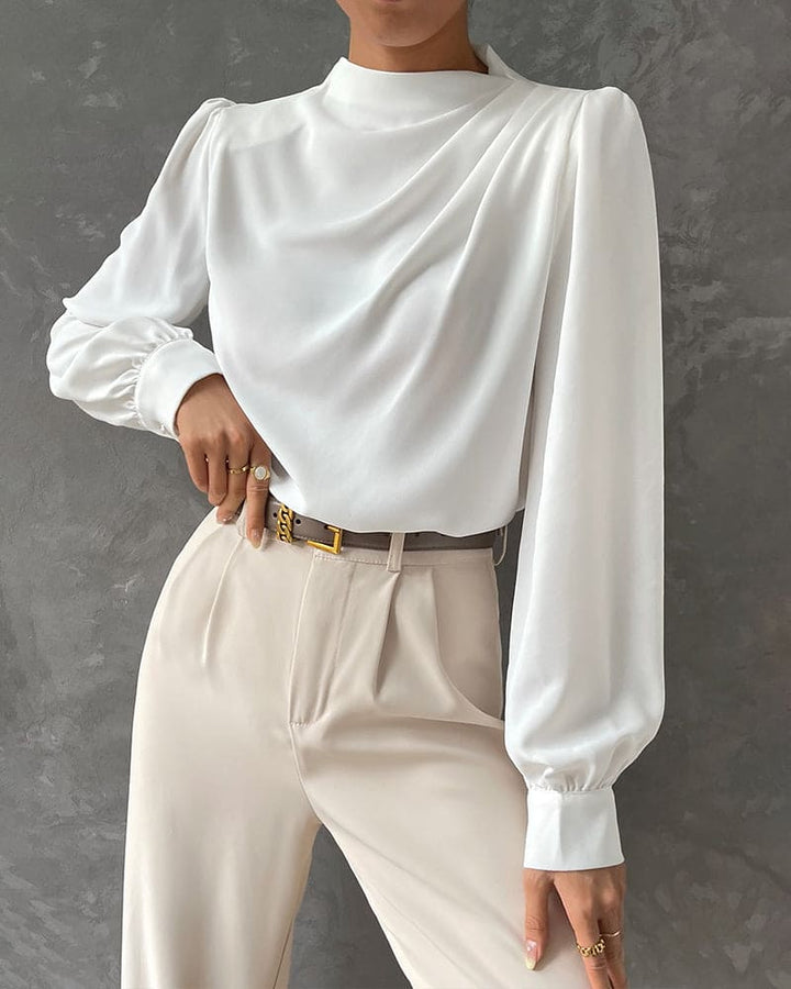 Levoire | Une Blouse Unie Avec Un Col Froncé Et Un Col Montant