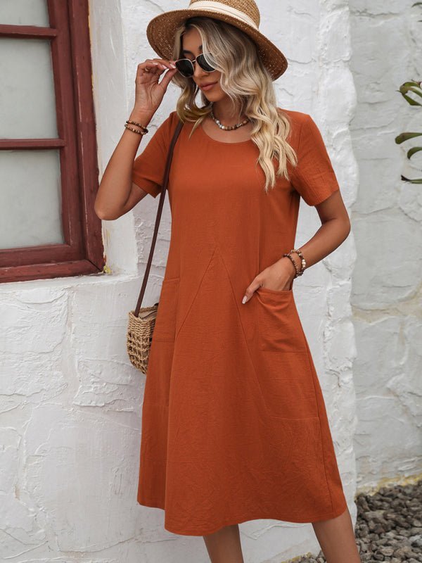 Levoire | Robe en coton à col montant à manches courtes avec plumes unies