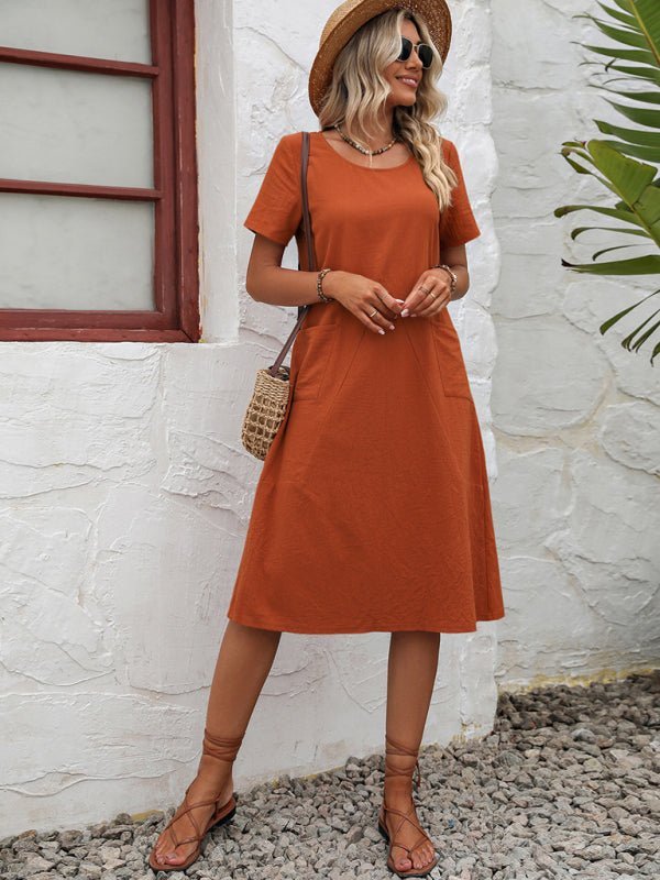 Levoire | Robe en coton à col montant à manches courtes avec plumes unies