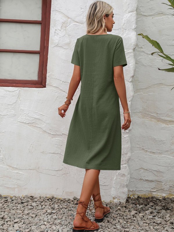 Levoire | Robe en coton à col montant à manches courtes avec plumes unies