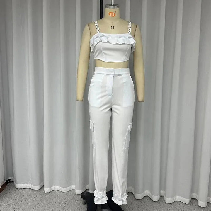 Levoire | Ensemble femme avec des pantalons taille haute, attachés aux chevilles, et un col carré uni