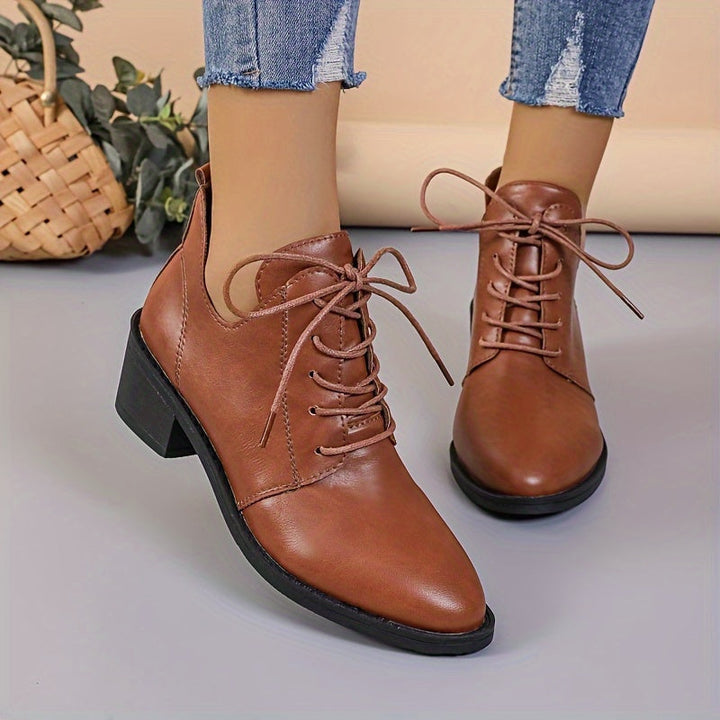Levoire | Bottes Unies Élégantes Avec Lacets Et Talons