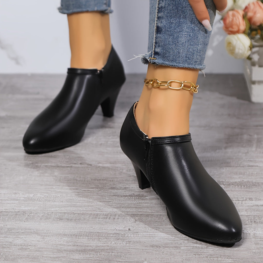 Levoire | Élégantes Chaussures À Talons Noirs Pour Femmes Avec Bout Pointu Et Botte À Cheville Ajustée Avec Fermeture Éclair