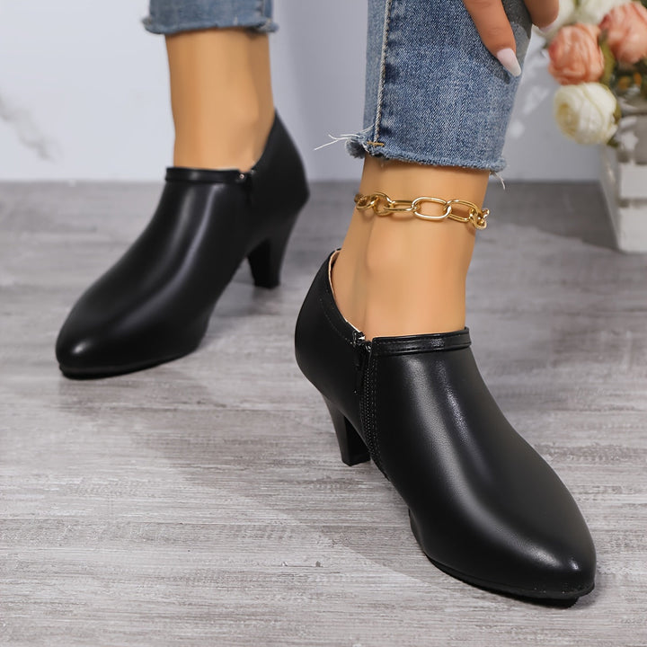 Levoire | Élégantes Chaussures À Talons Noirs Pour Femmes Avec Bout Pointu Et Botte À Cheville Ajustée Avec Fermeture Éclair