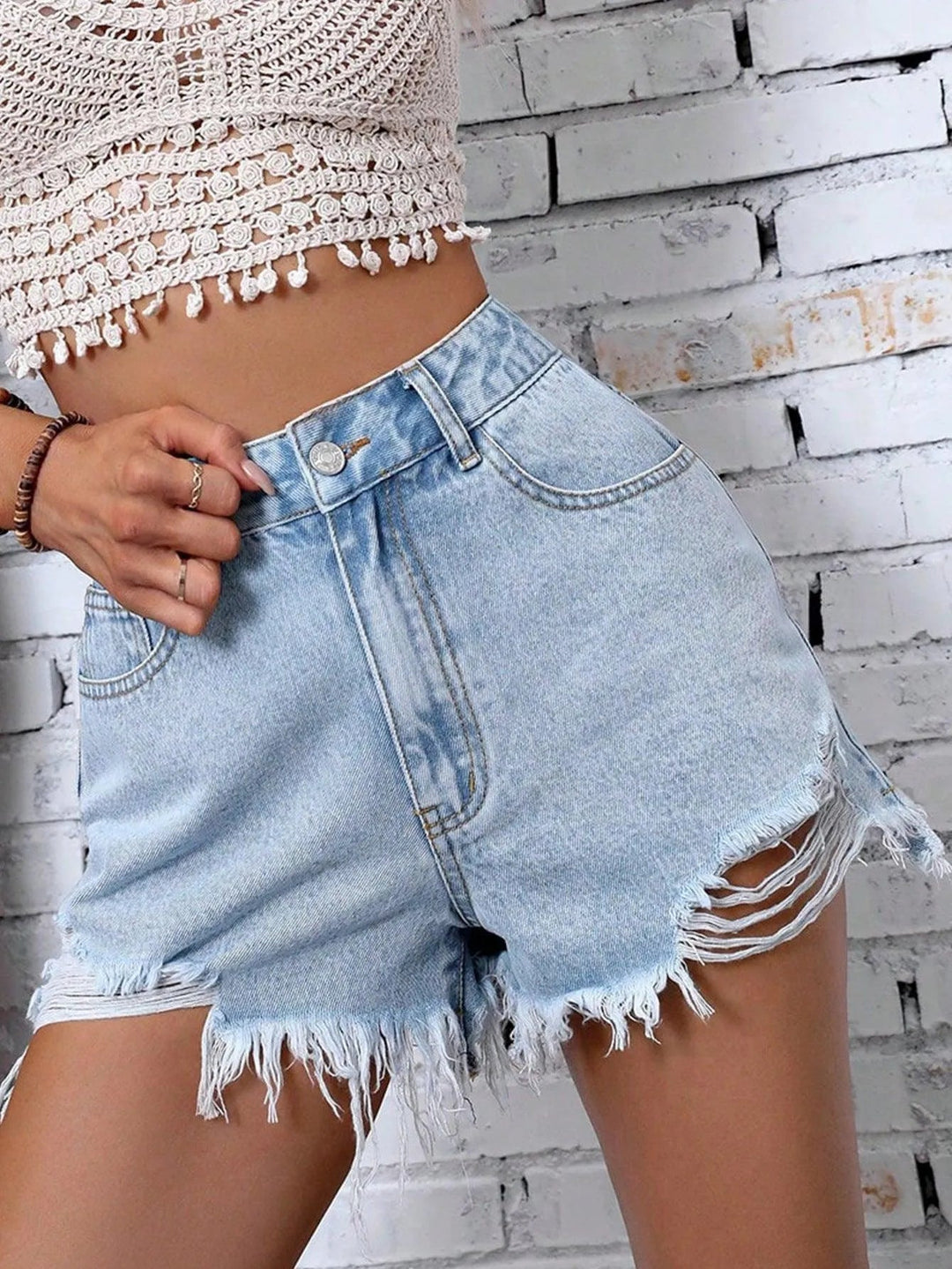 Levoire | shorts en jean déchirés Bleu ciel