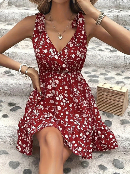 Levoire | Robe rouge à fleurs avec décolleté en V