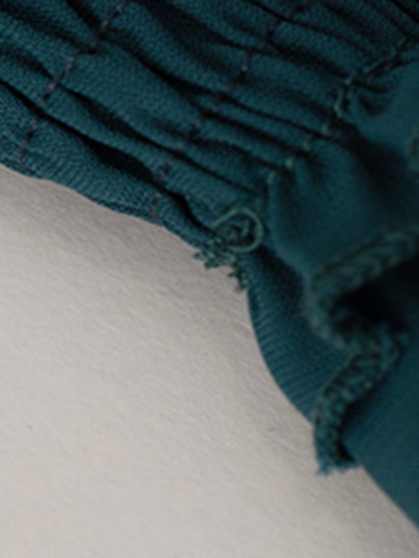 Levoire | Robe élégante et stylée avec des volants et décolleté en V
