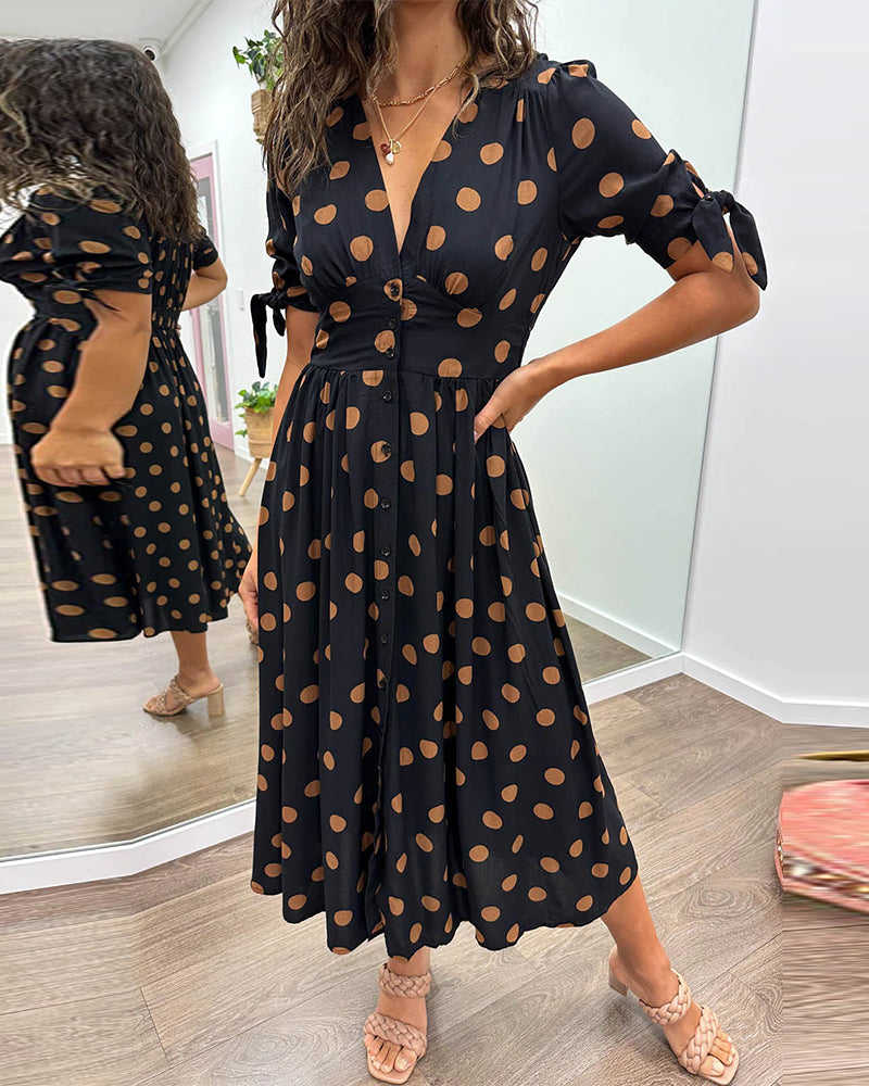 Levoire | Robe avec décolleté en V et pois Noir