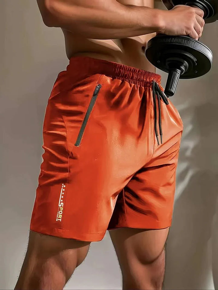 Levoire | Shorts De Sport Avec Cordon De Serrage Et Poches Zippées Orange Rouge