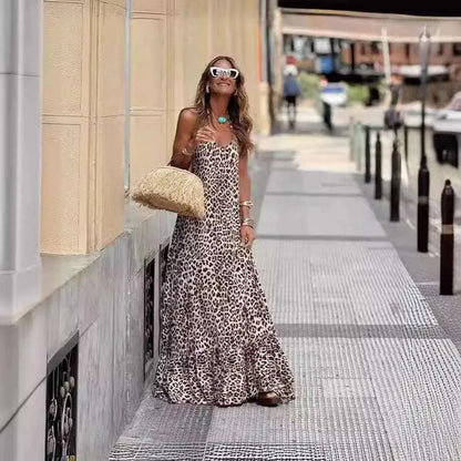 Levoire | Robe à bretelles sans dos et décolleté en V avec un motif léopard.