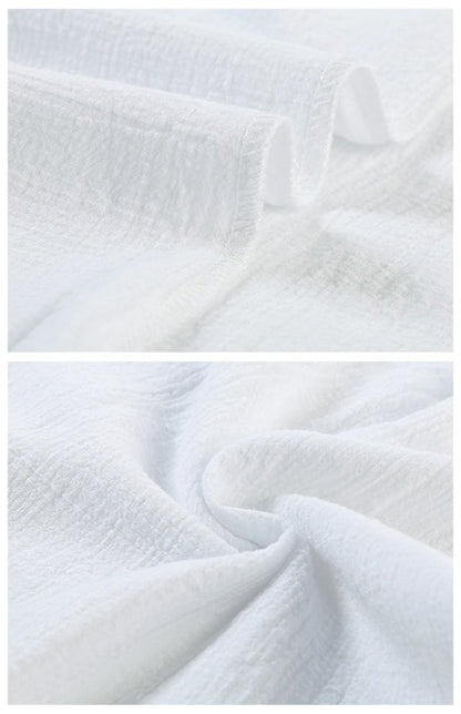 Levoire | Linrevers nappiraglan chemise à manches courtes avec blouse à fente incurvée