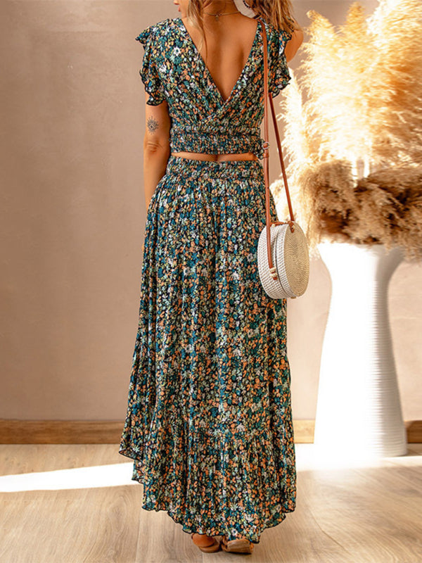 Levoire | Nouveau robe à manches courtes en tricot à col en V avec un motif floral dans une coupe étroite irrégulière