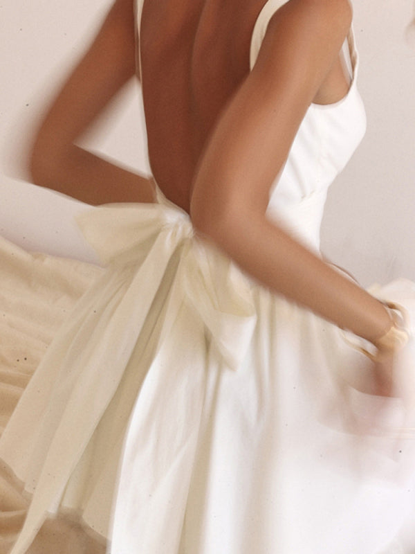 Levoire | Sophistiquée robe mini dos nœud