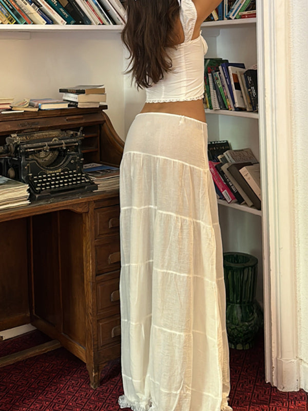 Levoire | Nouveau top féminin français avec un col carré modifié et un accessoire pointu dans un style de jupe de costume.